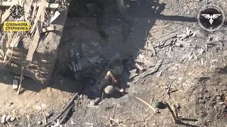 Three Russians were sitting under the remains of a house but a fpv drone destoys two of them