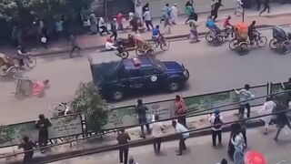 Bangladeshi Police Plow Through Rickshaws to Escape Protestors