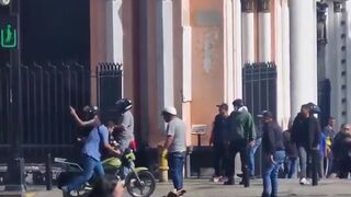 Paid Thugs Shoot Guns to Disperse Protestors in Venezuela as Police Standby and Do Nothing