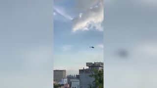 Bangladeshi police shooting from the helicopter in student protest