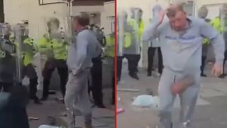 Rioter gets hit in the head and balls with bricks - Southport, England