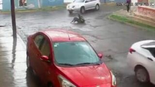 An elderly drunk man gets run over by an SUV while sitting in the road - Mexico