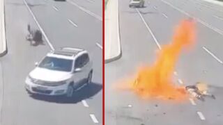 Motorcyclist is engulfed in flames after getting intercepted by SUV - Hohhot, China