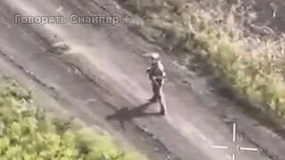 Russian soldier hits FPV drone with RPG