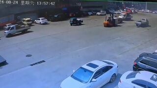 Woman walking on a busy road gets run over and killed by Forklift