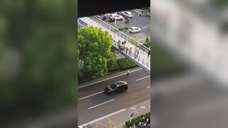 Attention Whore Falls From An Overpass In China