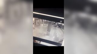 guy falls down from the escalator