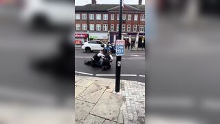 Police struggle to arrest someone