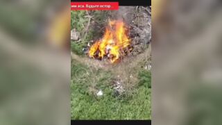 Ukrainian couple being burned alive.