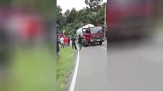 Half of the motorcyclist is still alive. Video.