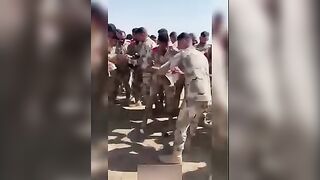 Soldiers eat live pigeons. Video. Iraq.