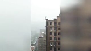 Fall from a high-rise building. Video.