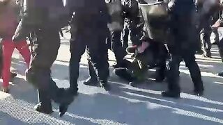 Vivid moment of beating protesters