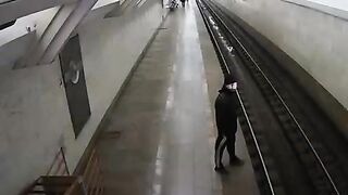 Man jumps under subway train. Suicide. Moscow.