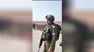 Israeli military against the background of the corpses of Hamas militants