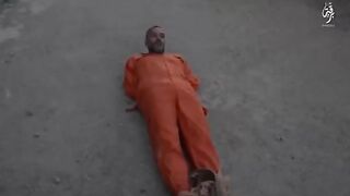 The terrorists tied the man to a truck and dragged him along the road