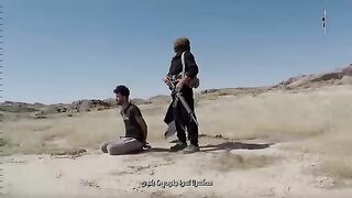 ISIS propaganda. Execution of a man. Video.