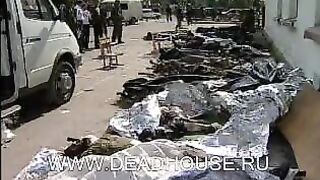 Beslan. Corpses of children and terrorists