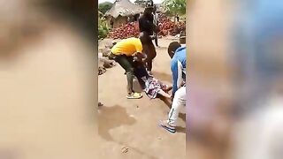 The thief is beaten with sticks on her bare ass