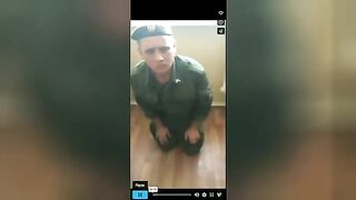 A young soldier is put on a bottle. Video.