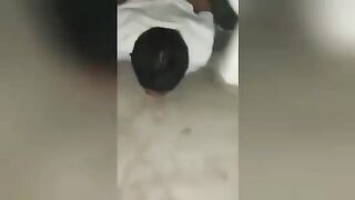 They cut his throat with a knife. Video.