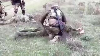 Ukrainians take Russian BMP crew prisoner. Video.