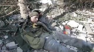 Corpses of Russian soldiers against the background of destruction