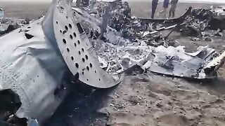 Downed Ukrainian helicopter and corpses of soldiers