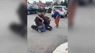 Dude Fights Cops Outside Chicken Joint