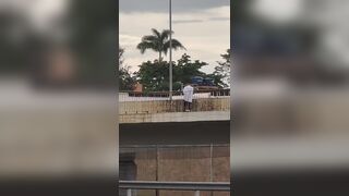 Man shoots himself with gun while on footbridge, after attacking his ex-partner who put a protective order on him. Brazil, 2 November 2024