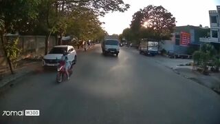 Bad Luck Vietnamese Moped Rider Thrown Under Dashcam Vehicle