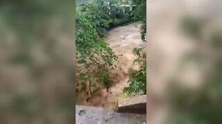 Bystanders Watch Man Drowning During Flood In Mexico