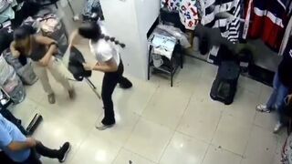 Shoplifting Woman Clubbed By Clothes Store Employee