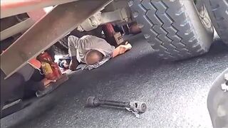 Elderly Cyclist Falls Under The Truck